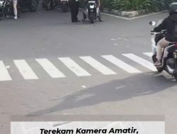 Cekcok Panas! Pengendara Berkaos Loreng Terobos Lampu Merah di Simpang UKI
